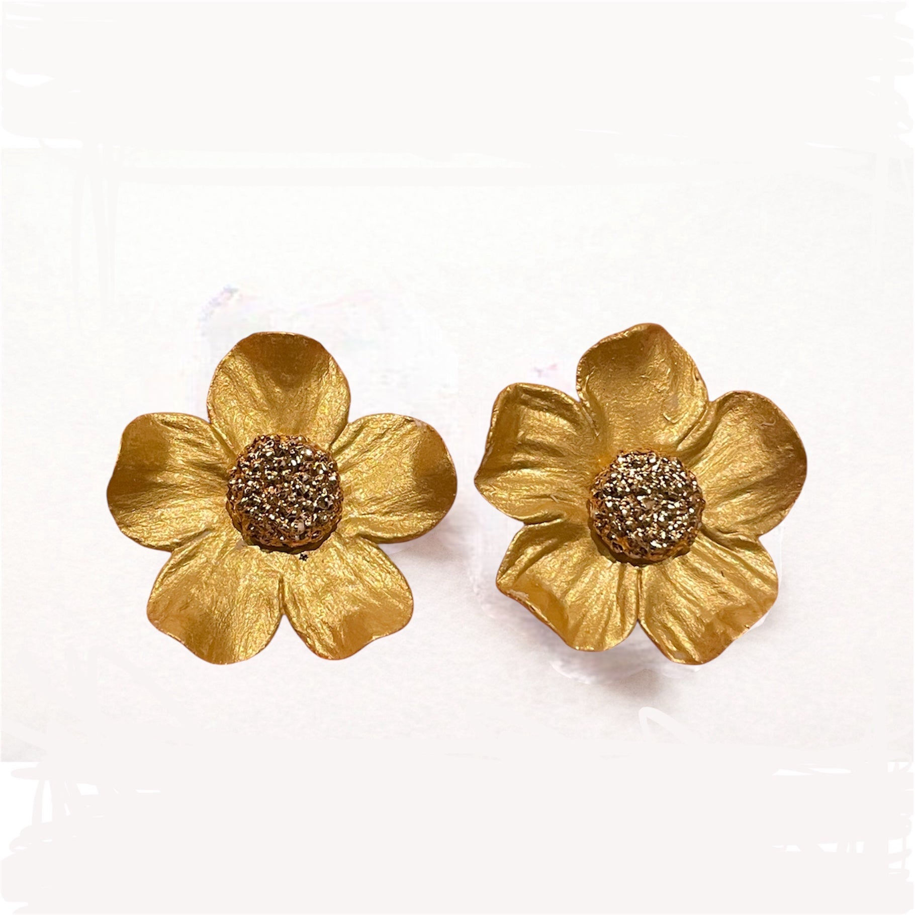 Pendiente Mariana . Dorado